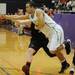 Huron senior Mike Lewis reaches after a loose ball in the second half against Pinckney during a district match up at Pioneer on Wednesday. Melanie Maxwell I AnnArbor.com